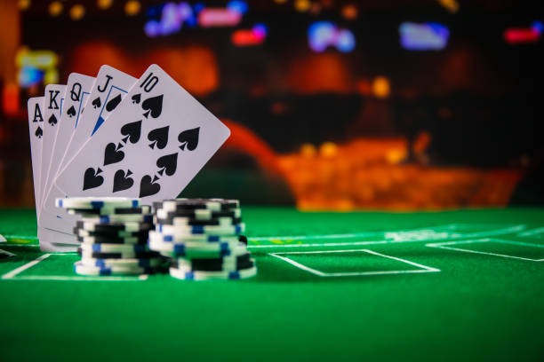 Dealer revealing hole card in Infinite Blackjack game
